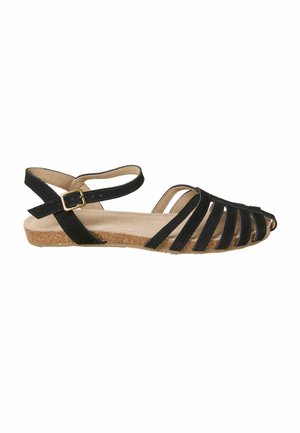 Schwarze Sandalen mit Riemchen und Korksohle, mit offenen Zehen und einem Knöchelriemen mit goldener Schnalle. Glatte Textur und minimalistisches Design.