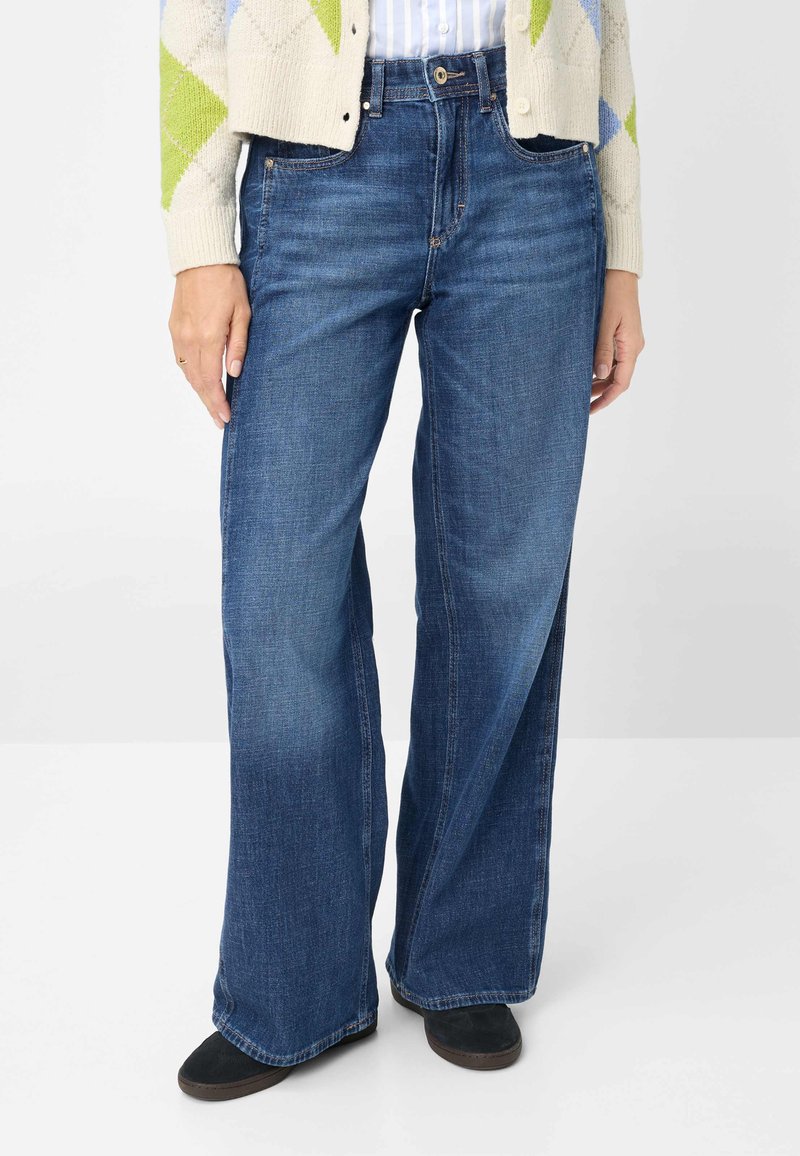 Wijde jeans van denim in donkerblauw, met een klassiek ontwerp van vijf zakken, rechte snit en een stoftextuur van middellicht gewicht.