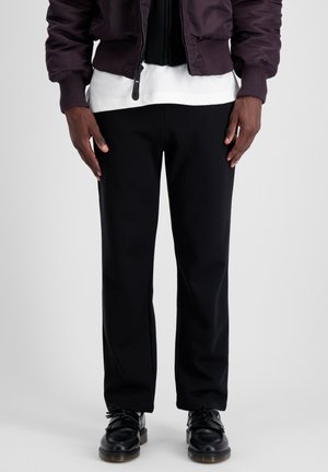 - Spodnie treningowe