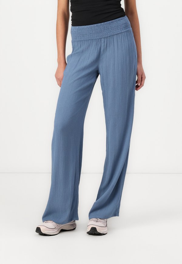 JOHNNY SMOCKED WAIST PANTS - Trousers