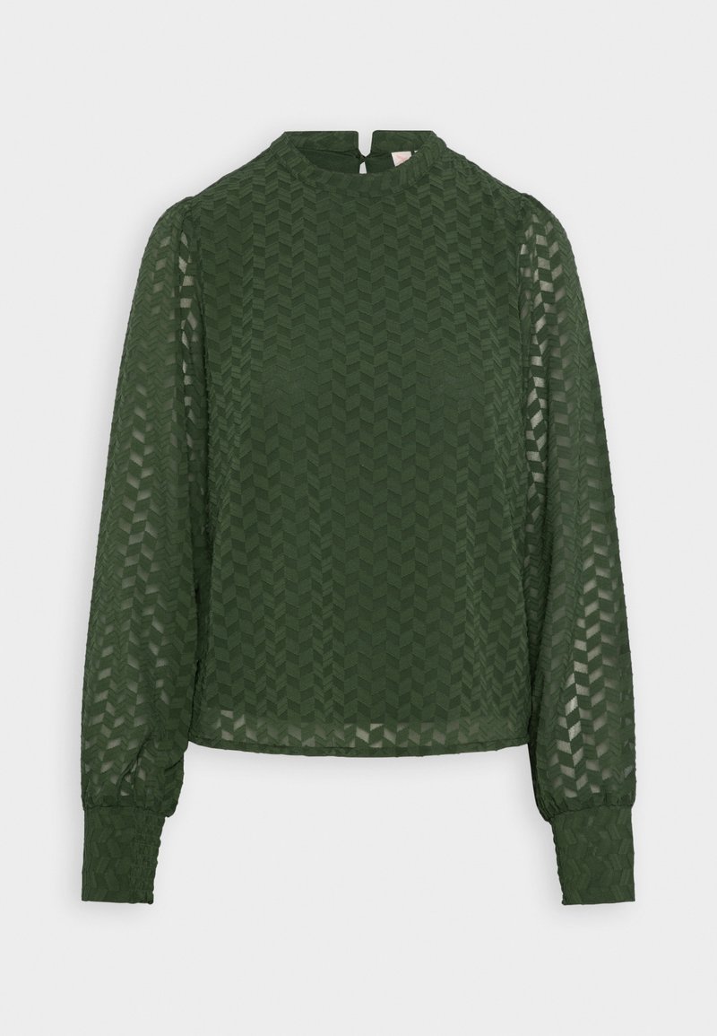 Blouse vert foncé à manches longues avec motif chevron texturé, manches bouffantes semi-transparentes, col haut et fermeture à boutons au dos.