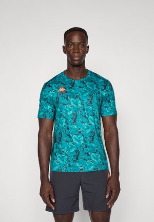 Teal patterned athletic shirt with short sleeves, featuring a black abstract design and an embroidered orange logo on the chest.