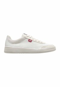 White canvas sneakers with textured surface, lace-up design, and a prominent red logo. Features a rubber sole and rounded toe.