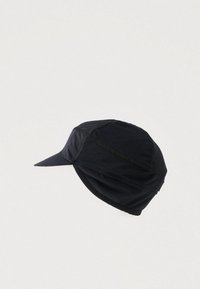 Must must valge pehme kangaga keha ja kaardus äärega. Omab kontrastset paneeli õmblust ning sobib mugavuse tagamiseks.