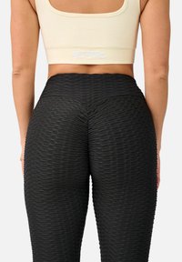 Megaman PUSH-UP - Leggings - Trousers - schwarz