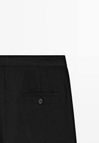 Black trousers with a smooth texture, featuring a back pocket and a single black button detail. Simple, classic design with a tailored fit.