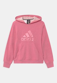 Felpa rosa realizzata in morbido materiale, con tasca frontale e un grande logo "adidas" in rilievo sul petto. Comprende un cappuccio con cordino.