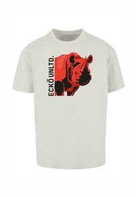 Lichtgrijze katoenen t-shirt met een grote rode en zwarte afbeelding van een neushoorn naast de tekst "ECKŌ UNLTD."