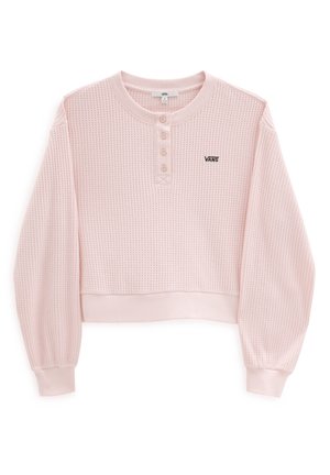 Crop top à manches longues en maille gaufrée rose clair avec patte à quatre boutons et petit logo Vans noir sur la poitrine.