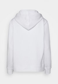 Sweat-shirt à capuche blanc avec une texture lisse, poche kangourou et poignets côtelés. Design au dos uni sans logos ni motifs visibles.