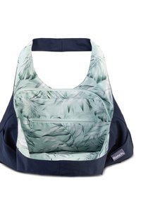 Marineblauwe tas met een brede opening, met een mintgroene binnenkant versierd met palmbladvormen en een ritszak.