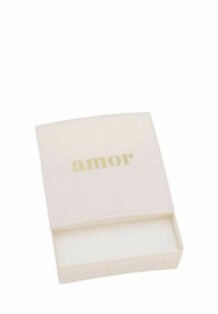 Caja cuadrada de color crema con un acabado suave y bordes ligeramente redondeados; presenta la palabra "amor" en texto dorado en la parte frontal.