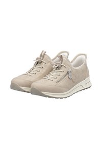 Beige athletic shoes with a textured leather upper, decorative zip, and lace-up design. Features a cushioned sole and subtle branding.