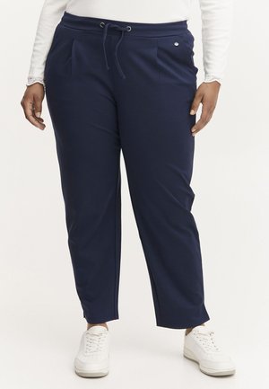 Navy blue joggers with a drawstring waist, two front pockets, and a small decorative accent. Made from soft, lightweight fabric.