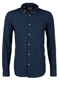 Mörkblå långärmad skjorta med knapp-down krage, framficka och vita knappar. Tillverkad av bomull med en slät textur.