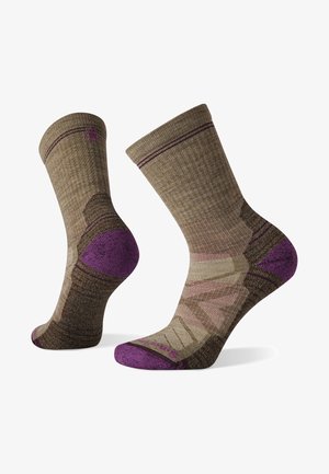 Brown and beige patterned socks with purple accents, featuring ribbed texture, cushioned heel, and reinforced toe for durability.