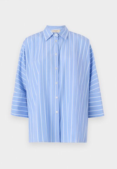 Light blue striped shirt with short sleeves, features a pointed collar, button front, and vertical white stripes. Smooth fabric texture.