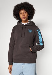 Dark gray hooded sweatshirt with a front pocket, featuring blue printed text on the left sleeve and a blue logo on the chest.