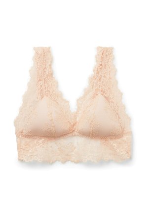 Lace triangle bralette in soft peach with scalloped edges, floral pattern, and wide lace straps for support. Lightweight and textured fabric.