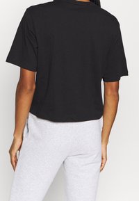 Puma Triko s potiskem - black