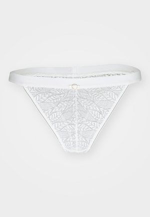 Weiße Spitzenstring mit geometrischem Muster, glattem Bund und einem kleinen runden Dekorelement auf der Rückseite.