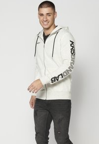 Koroshi Sudadera con cremallera - crudo