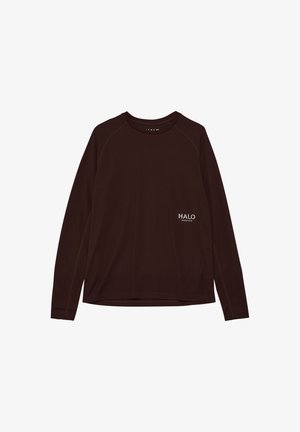 Langærmet brun skjorte i et tekstureret materiale. Har en rund hals, raglanærmer og et lille hvidt logo på venstre side.