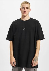 Mister Tee UNISEX CRUCIAL OVERSIZE - Triko s potiskem - black