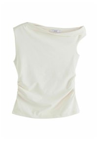 Top sans manches en crème clair avec un décolleté asymétrique, une texture douce et des détails froncés sur le côté pour une silhouette ajustée.