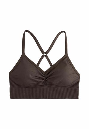Brązowy sportowy biustonosz bezszwowy z marszczonym przodem i skrzyżowanymi cienkimi ramiączkami, szeroka prążkowana opaska na dole.