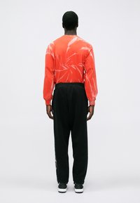 Aries UNISEX czarny