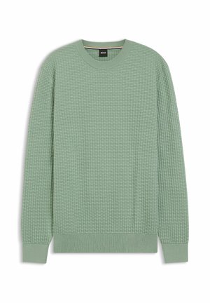 Light green sweater with a textured, woven pattern. Features a round neckline and ribbed cuffs and hem. Fabric appears soft and comfortable.