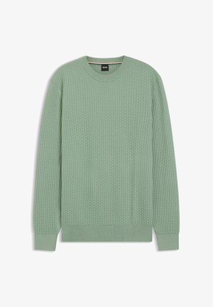 Vaaleanvihreä neulepaita teksturoidulla, kudotulla kuviolla. Siinä on pyöreä kaula-aukko sekä resorit hihansuissa ja helmassa. Kangas näyttää pehmeältä ja mukavalta.