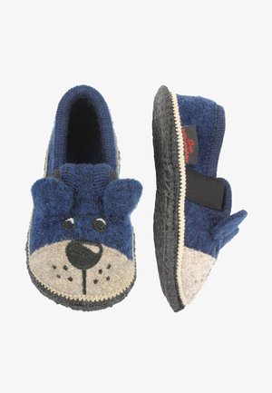 Blauwe wollen slippers met een hondengezicht ontwerp, grijs viltneus en zwarte rubberen zool. Inclusief elastische band voor een veilige pasvorm.