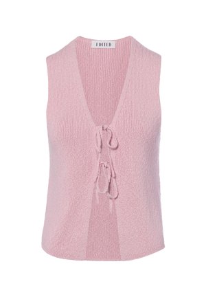 Ärmellose pinke Strickweste mit tiefem V-Ausschnitt und zwei vorderen Bindverschlüssen, am Kragen mit "Edited" beschriftet.