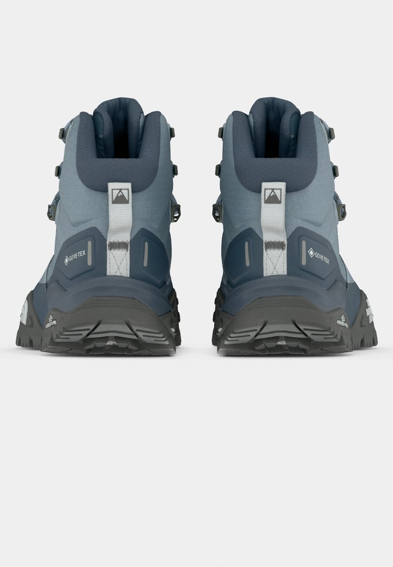 Vandrestøvler med en grå tekstiloverdel med mørkeblå accenter, robuste gummisåler og flere snørehuller for sikker fastgørelse.