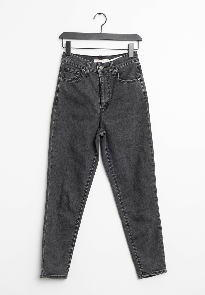 Korkeavyötäröiset mustat farkut, joissa on slim fit -leikkaus, viisi taskua ja hopeiset nappikiinnitykset. Sujuva pinta, minimaalinen kuluminen ja klassinen muotoilu.