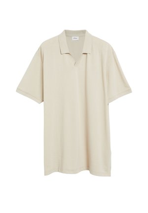 Polo beige à manches courtes en tissu texturé avec col en V, présenté sur fond blanc.