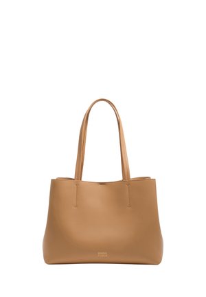 Tan leather tote bag with two shoulder straps and subtle brand logo "Bimba Y Lola" on the front.