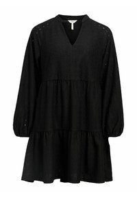 Robe noire avec un décolleté en V, des manches bouffantes longues et un design en niveaux. Confectionnée dans un tissu texturé avec un motif floral.