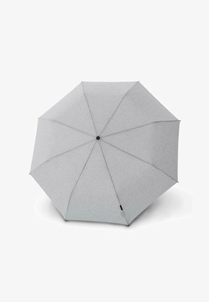 Hellgrauer Regenschirm mit acht Segmenten, schwarzem Mittelstück und kleinen schwarzen Spitzen an jedem Segmentrand.