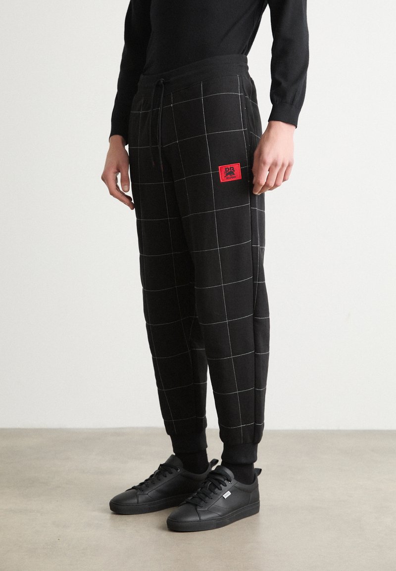 HUGO DRAG - Träningsbyxor - black