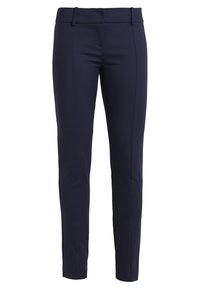 Pantalons slim-fit bleu marine avec taille mi-haute, passants de ceinture et un design avant épuré sans poches ni fermetures visibles.