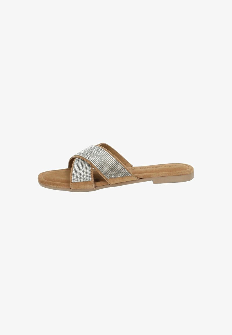 Tan slide sandal with crossed straps, embellished with clear rhinestones, soft suede texture, flat sole, and open toe design.