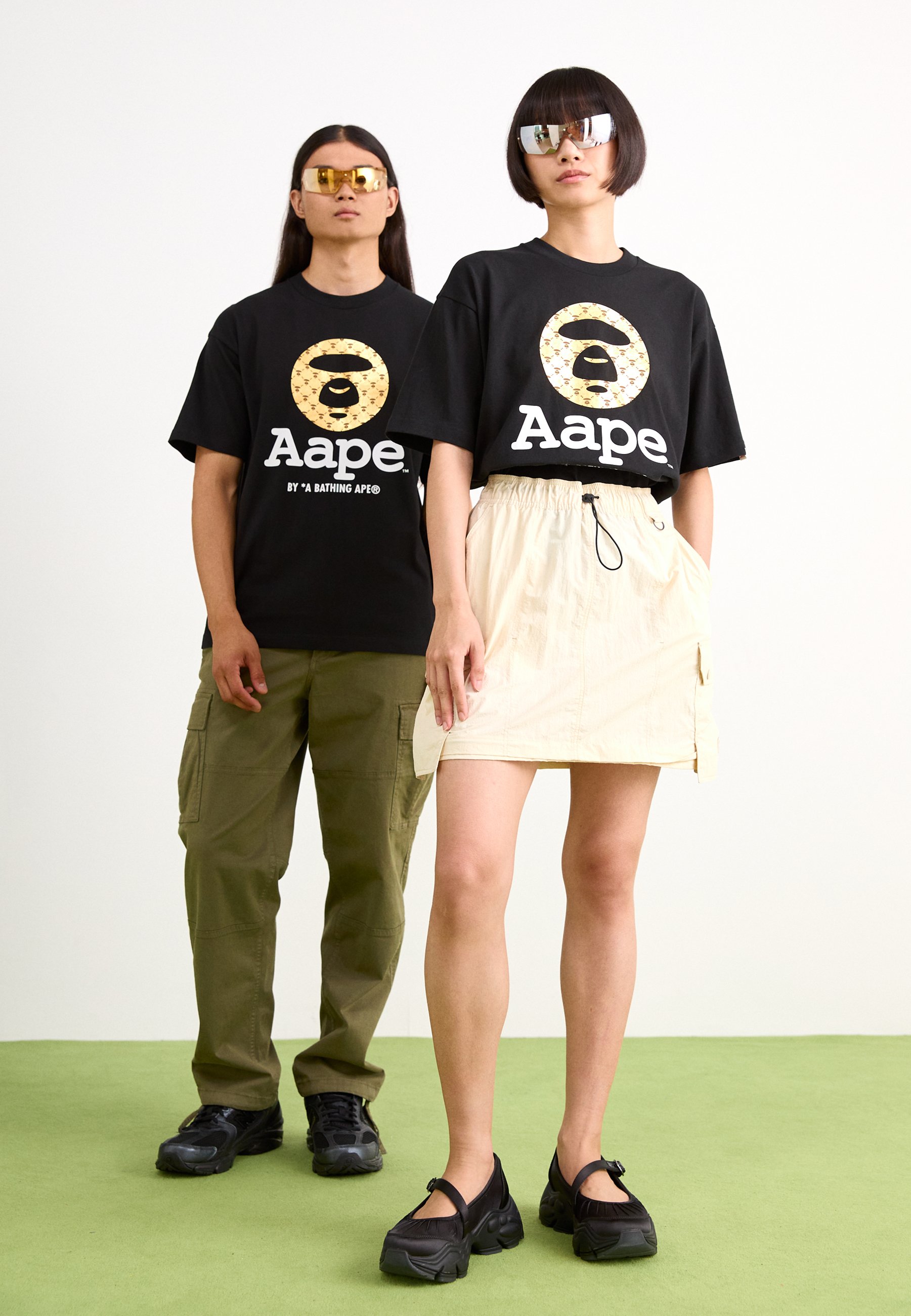 【 A BATHING APE】Aape Tシャツ AAPE By A Bathing Ape – T-shirt w kolorze złamanej bieli z