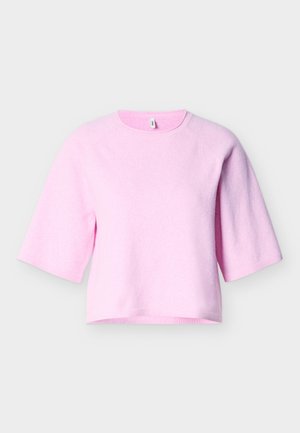 Short-sleeve pullover made of soft pink material with a round neckline and ribbed hem. Features raglan sleeves and a relaxed fit.