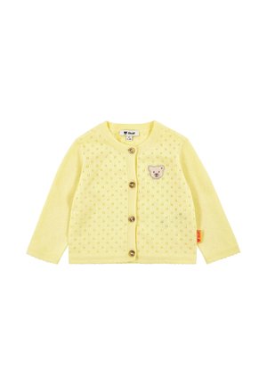 Yellow knitted cardigan featuring a round neckline, button closure, bear embroidery, and a scalloped hem with a small label tag.