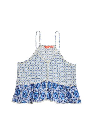 Top sans manches à motif bleu et blanc avec un ourlet évasé, présentant un design géométrique et des accents floraux sur la partie inférieure.