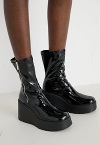 Platform ankle boots - black