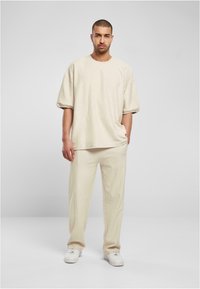 Urban Classics Kelnės - softseagrass